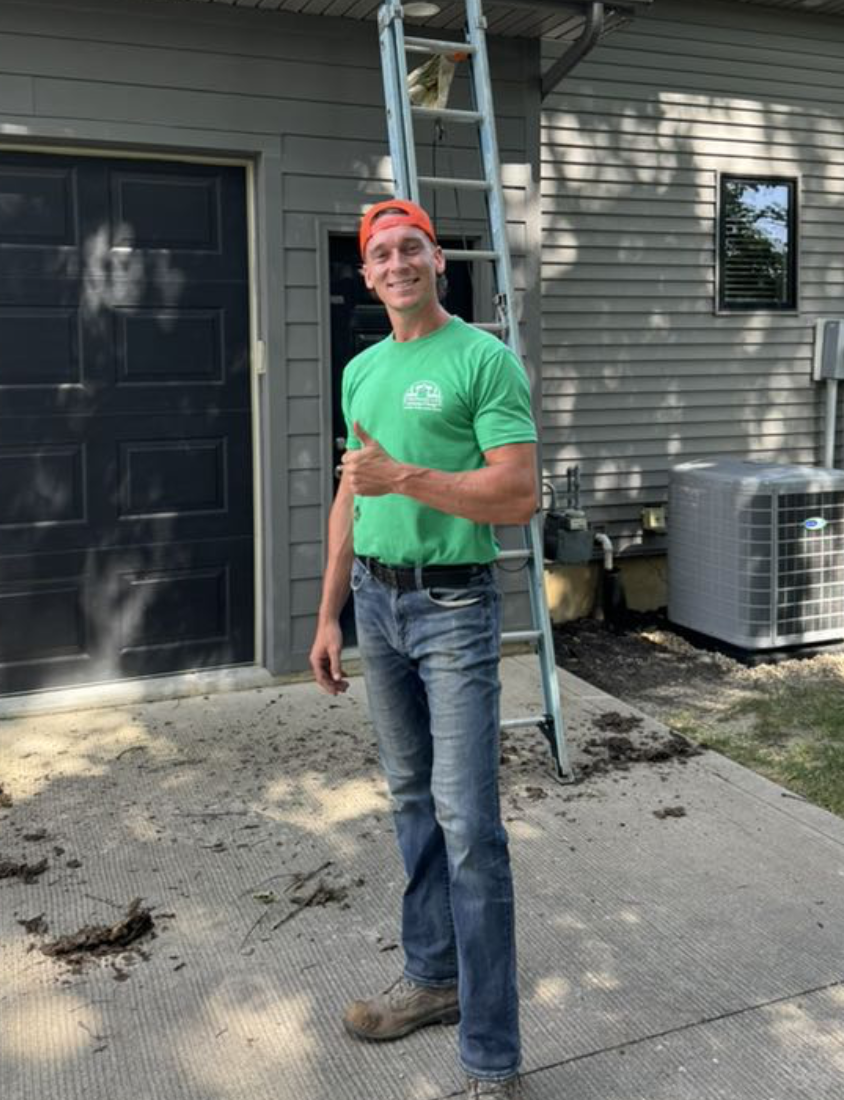 Strongscape's owner on a job site in a company shirt, ready to start work